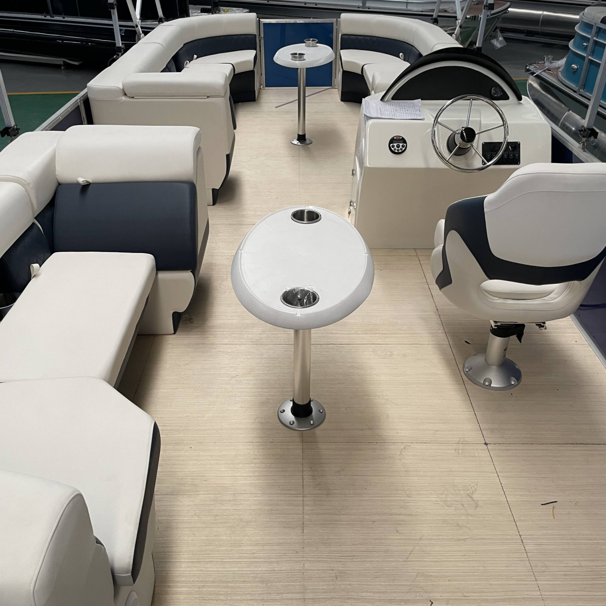 Tritoon Pontoon Boat on the water
